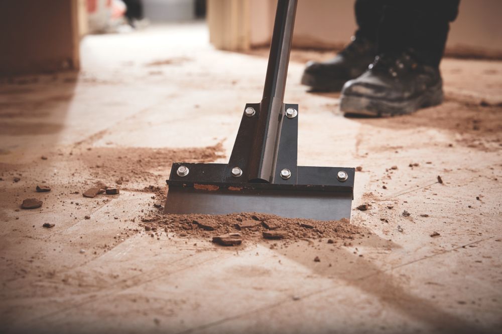 Garage floor outlet scraper