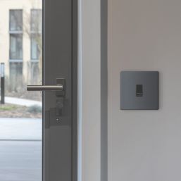 British General Evolve 10A 1-Gang 1-Way Press Switch Grey with Black Inserts