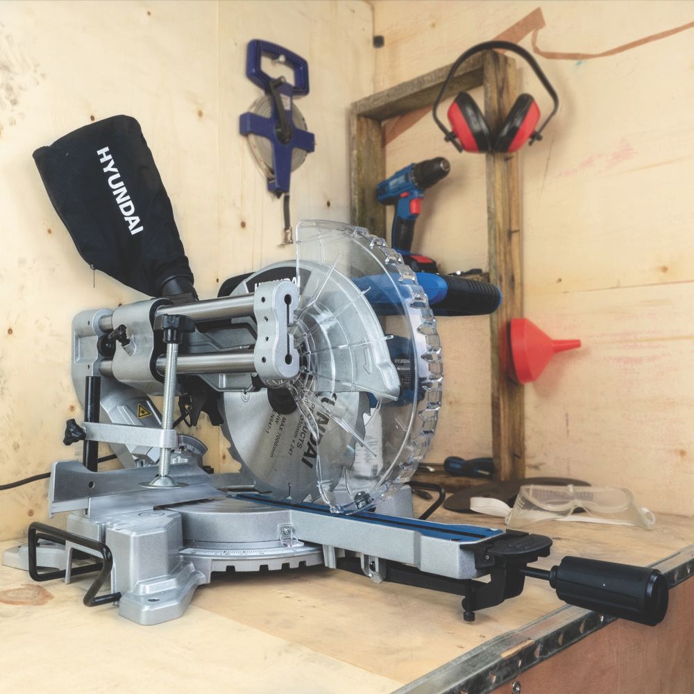 Mitre saw with store trenching facility