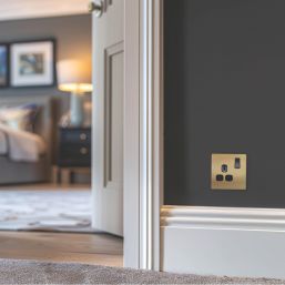 British General Evolve 13A 1-Gang SP Switched Socket Satin Brass  with Black Inserts