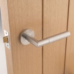 Eclipse Ultimate Revolve Fire Rated Lever On Rose Door Handle Pair Satin Stainless Steel 1 Pair