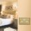 Varilight  13A 2-Gang 2-Pole Switched Socket Georgian Brass  with White Inserts