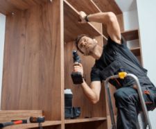 Person building a wardrobe.