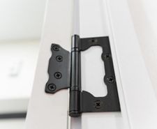 black composite door hinge