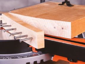 Cut Wood With Embedded Nails