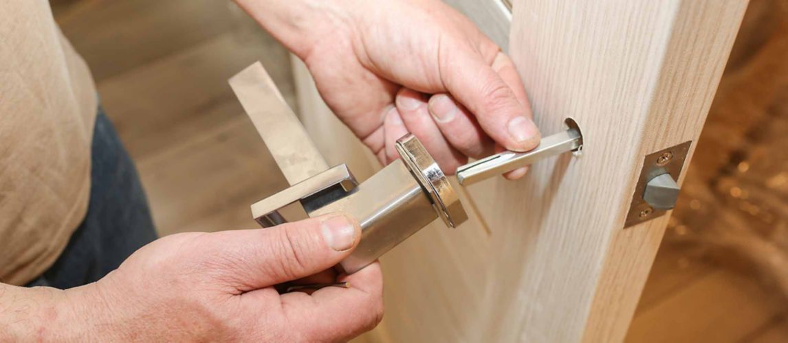 Person installing a door handle
