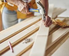 Image of a nail being hammered
