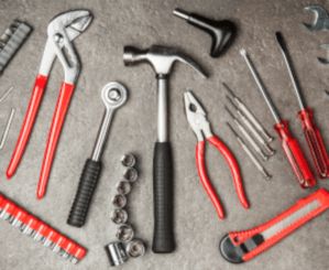 different hand tools on floor