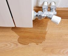 radiator leak on wooden floor