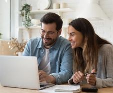 Young couple planning their new kitchen