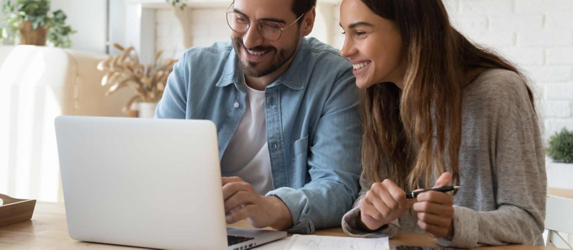 Young couple planning their new kitchen