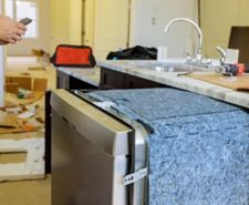 Dishwasher ready to be installed into kitchen