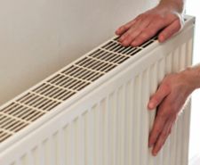 hand touching a radiator