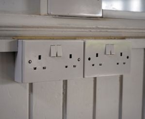 two double sockets on wall