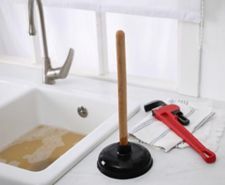 sink with plunger on the side